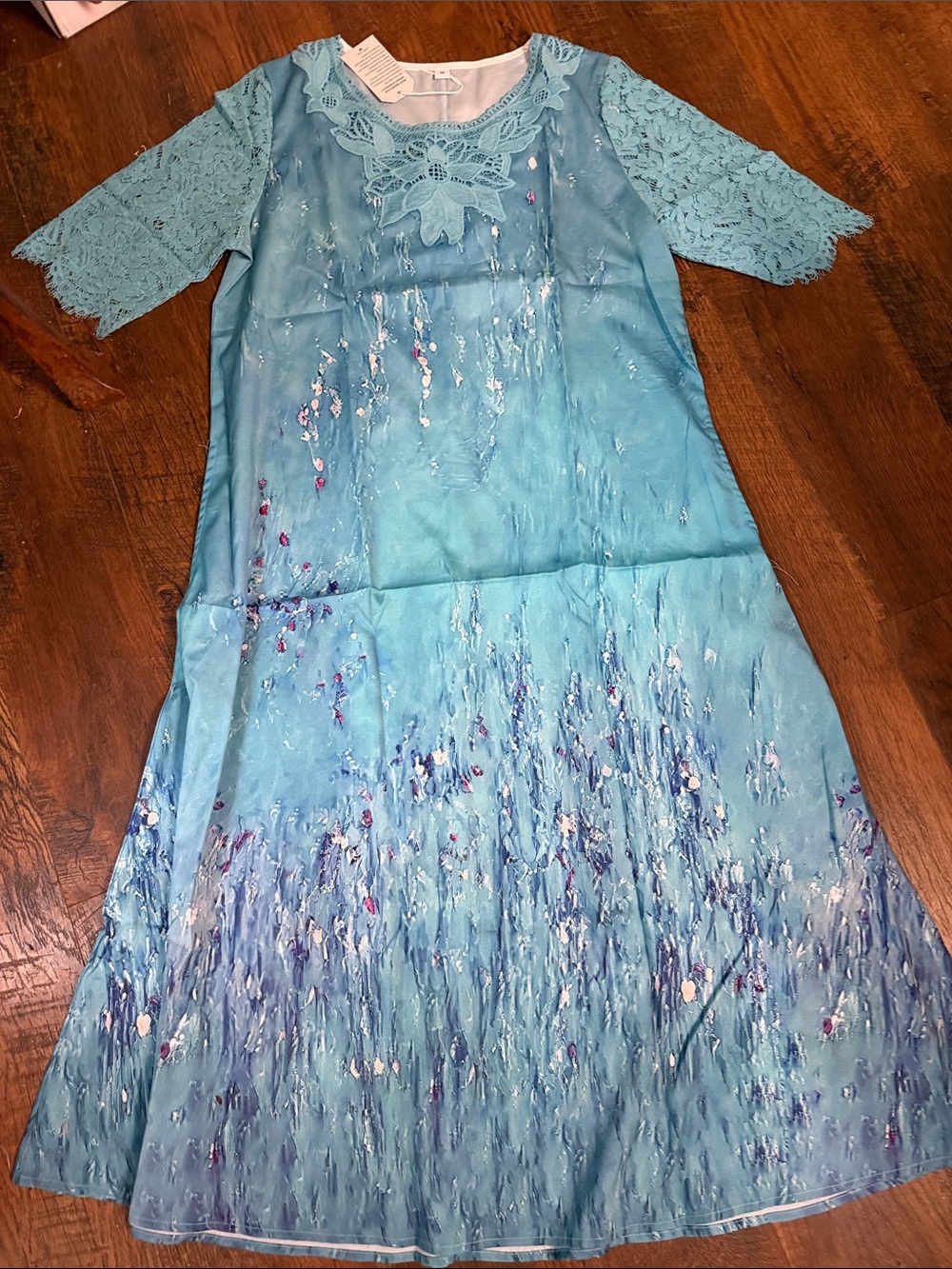 Light Blue Lace-Sleeve Maxi Dress with Floral Accent